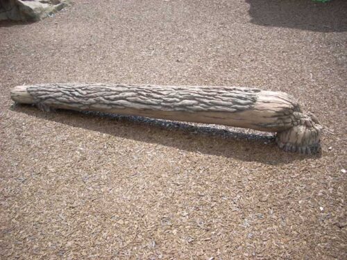 Fallen steady log can be used as a balance beam in a playground