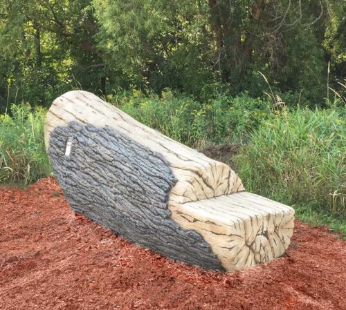 Realistic looking log that ramps upwards and provides a balance and agility challenge to kids on the playground