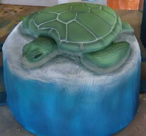 Sea turtle stepper, part of Pod Hopper series, that can be used to make paths to large playground structures or part of an obstacle course.