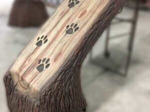 Climber made to look like an inclined log with animal prints